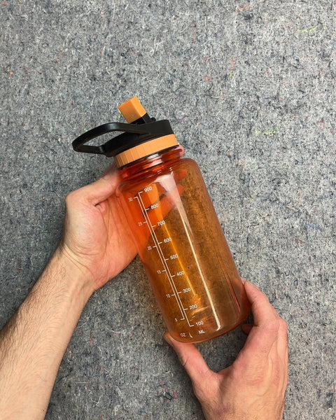 Orange Water Bottle That Can Help You Track Your Hydration Too