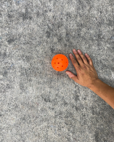 Orange Plastic Pickleball