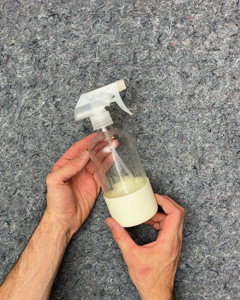 Clear Glass Spray Bottle with White Silicone Sleeve