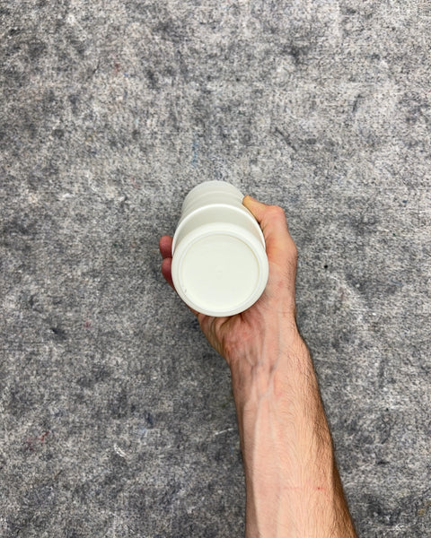 Four White Stackable Plastic Drinking Cups